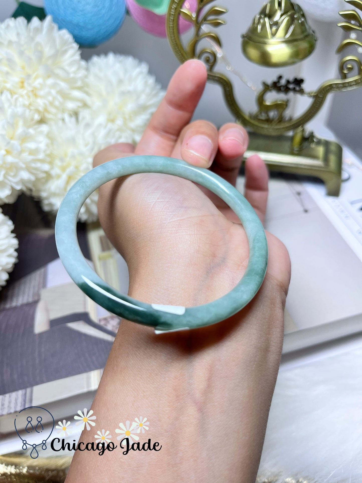 56mm Size M Light Green Round Jadeite Jade Bangle with Touches of Darker Green