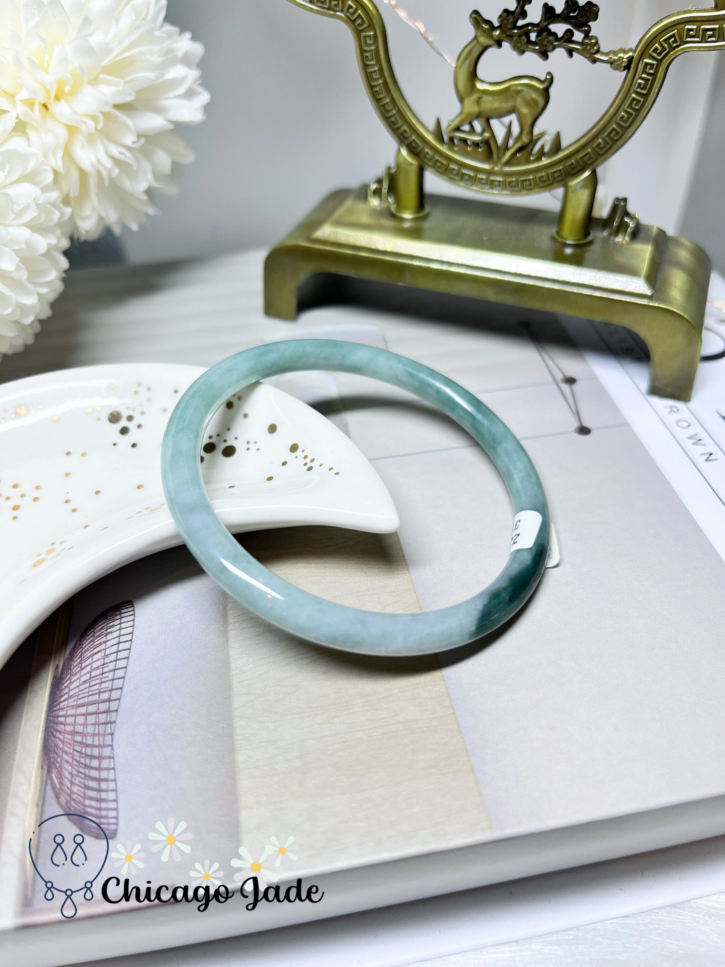 56mm Size M Light Green Round Jadeite Jade Bangle with Touches of Darker Green