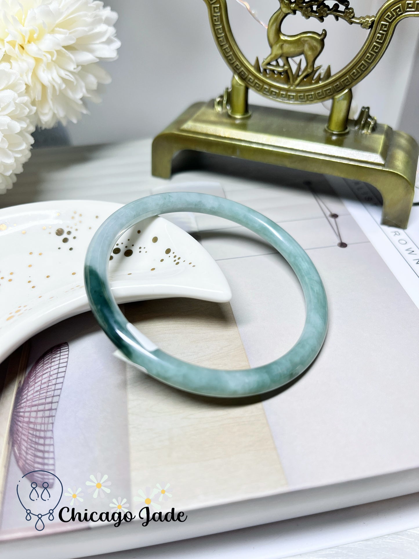 56mm Size M Light Green Round Jadeite Jade Bangle with Touches of Darker Green