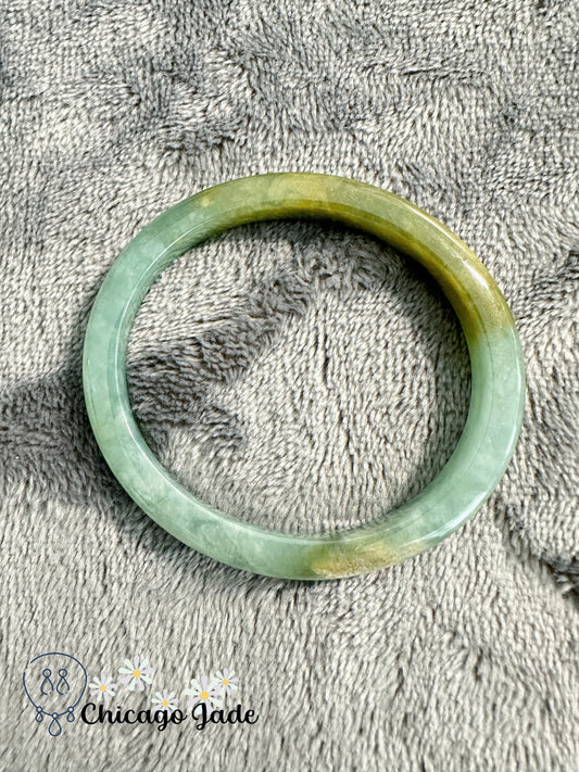 Oval shaped green yellow jadeite jade bangle good value natural untreated size XS