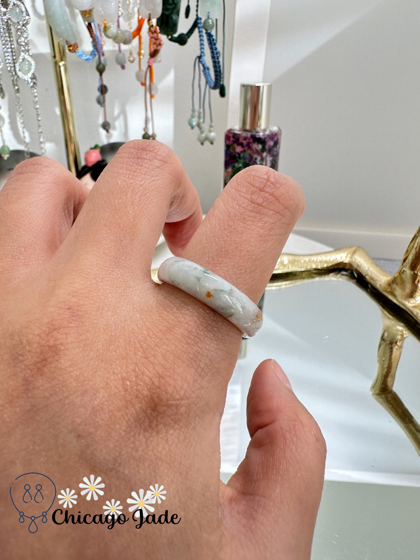 White base with highlights of orange and touches of dark jadeite jade ring band - size 6-6.5 authentic with certificate