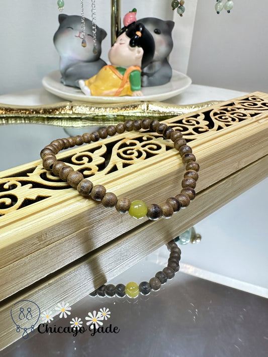 Bright yellow jadeite jade bead with wood beaded bracelet