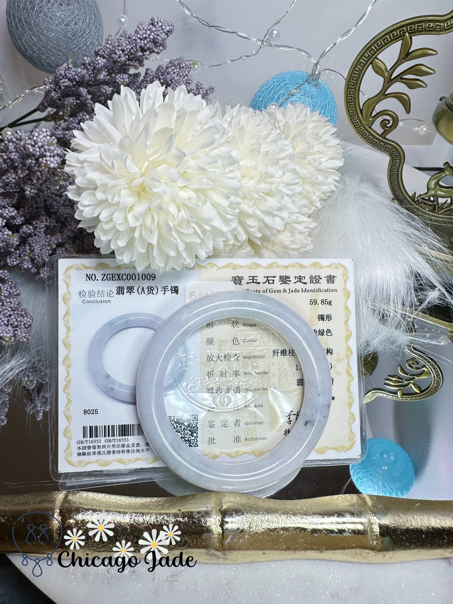 55.3mm Moonlight white with touches of wuji dark spots and green flower natural untreated Burma jadeite jade feicui bangle