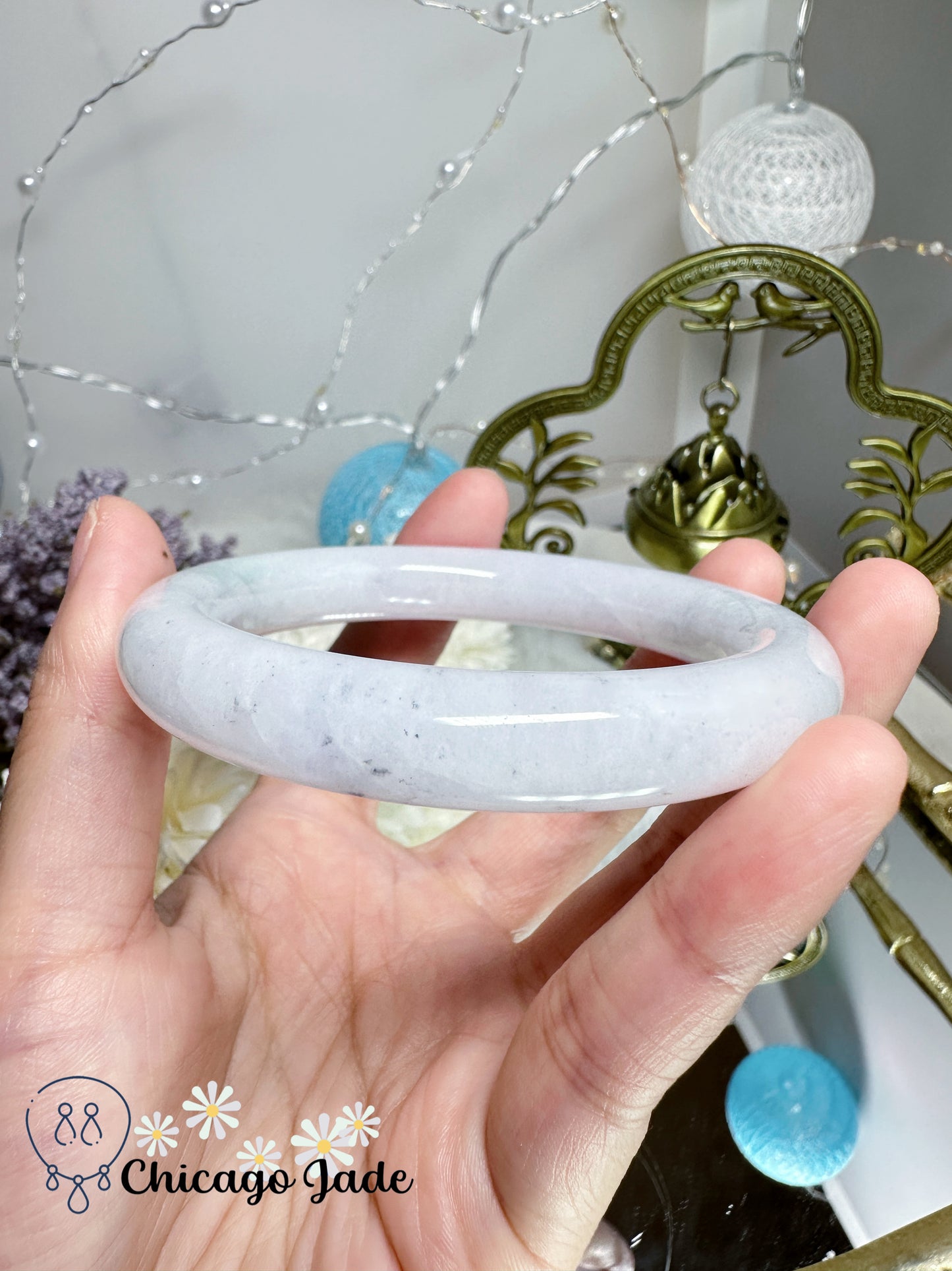 55.3mm Moonlight white with touches of wuji dark spots and green flower natural untreated Burma jadeite jade feicui bangle