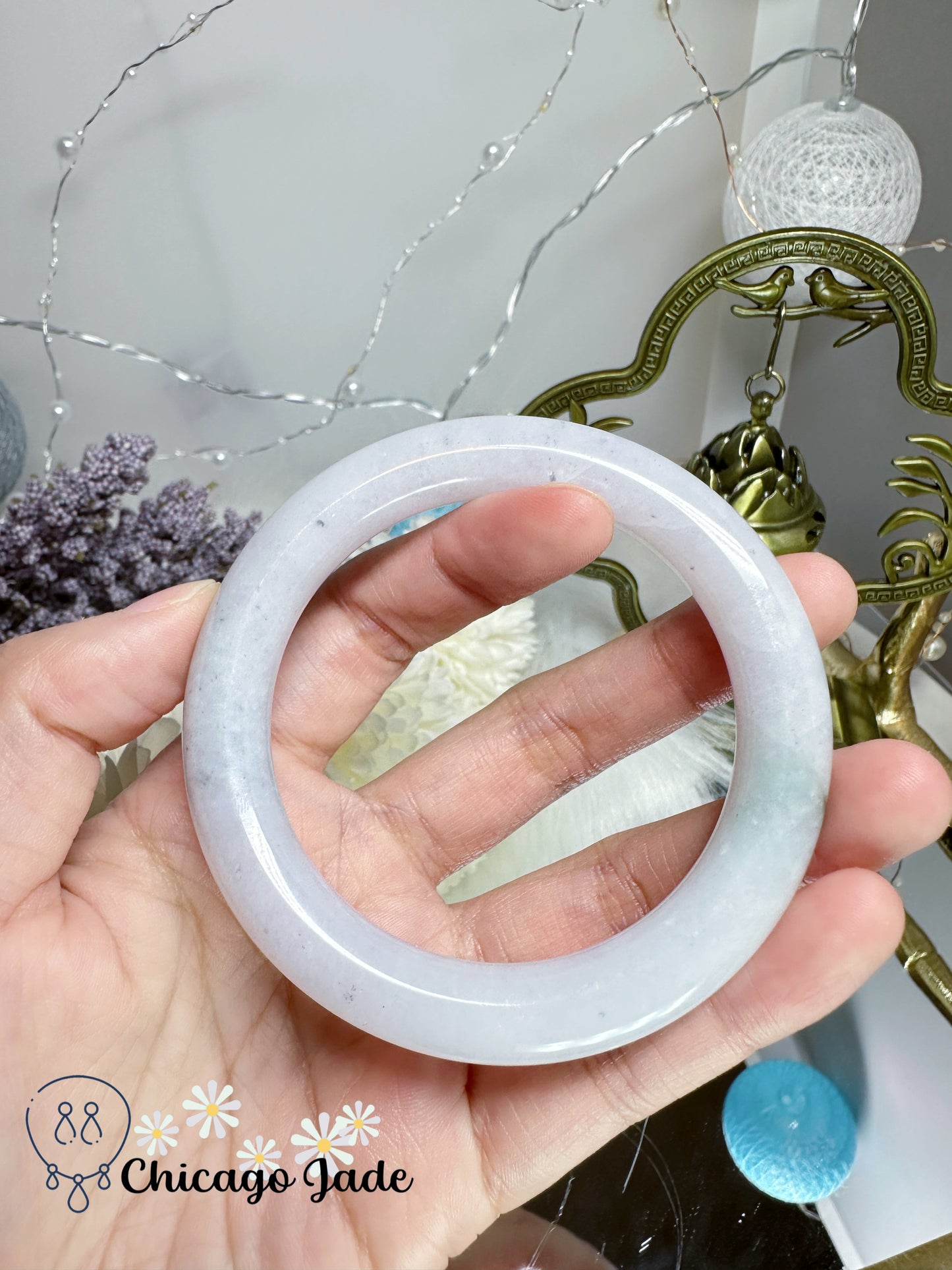 55.3mm Moonlight white with touches of wuji dark spots and green flower natural untreated Burma jadeite jade feicui bangle