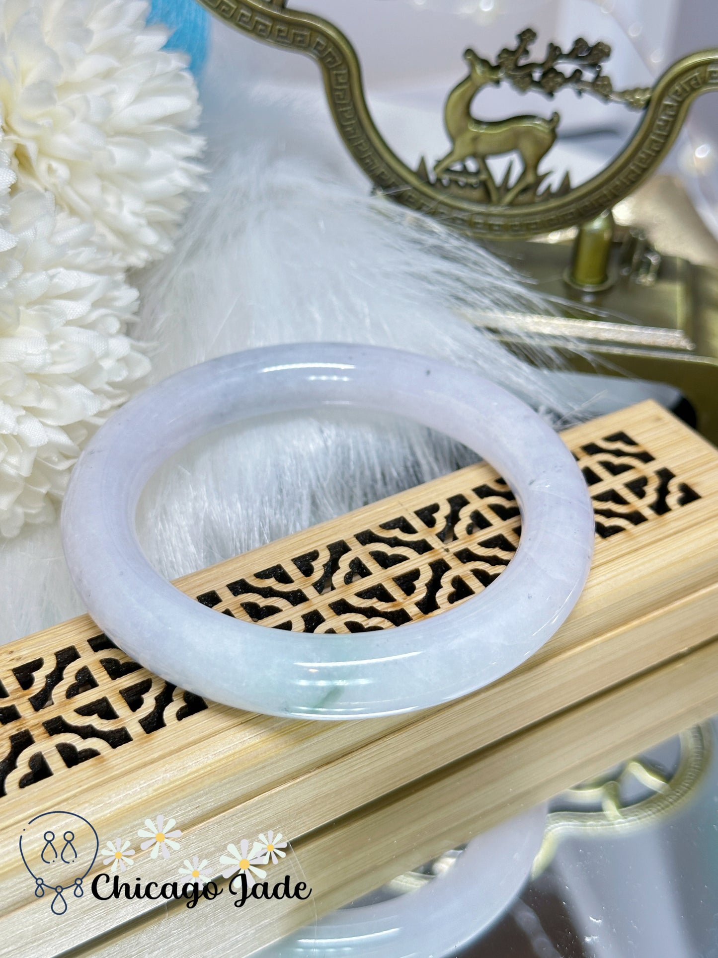 55.3mm Moonlight white with touches of wuji dark spots and green flower natural untreated Burma jadeite jade feicui bangle