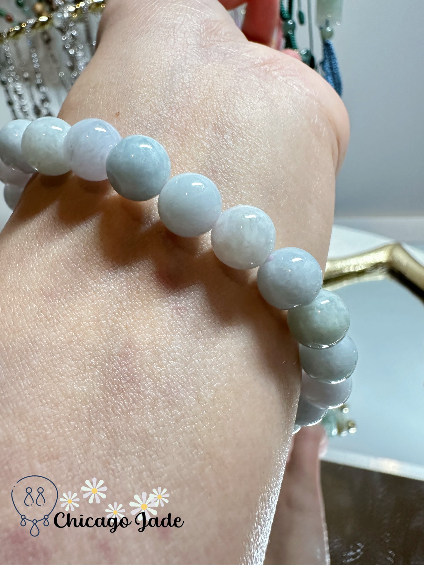 Milky base with a tint green tone jadeite jade beaded bracelet