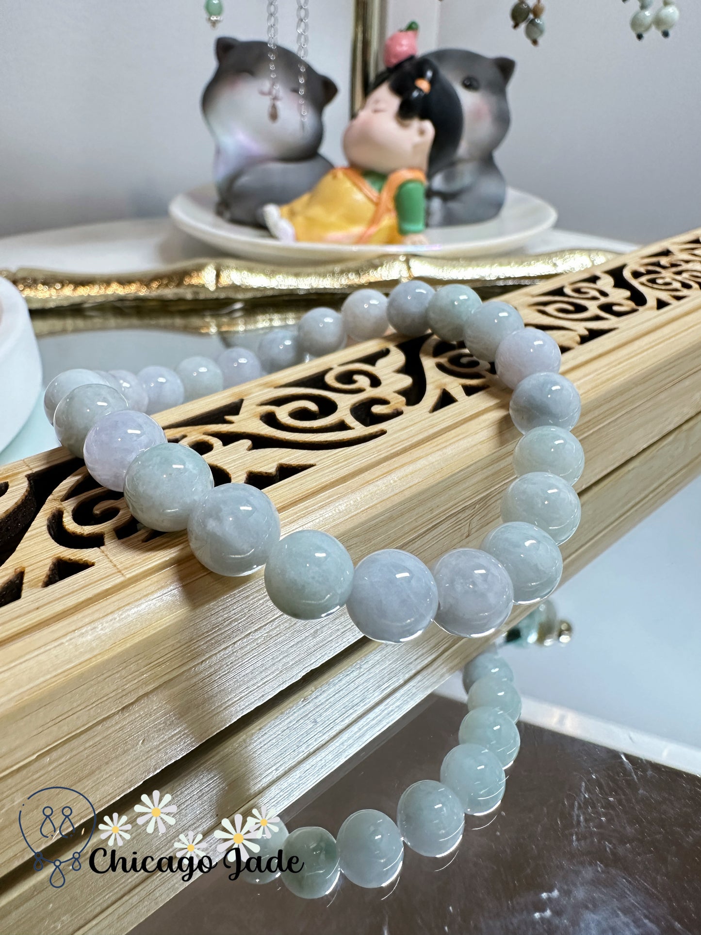 Milky base with a tint green tone jadeite jade beaded bracelet