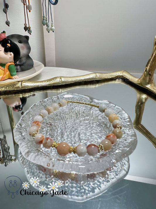 Rare find milk white base with orange and pink highlights natural jadeite jade beaded bracelet