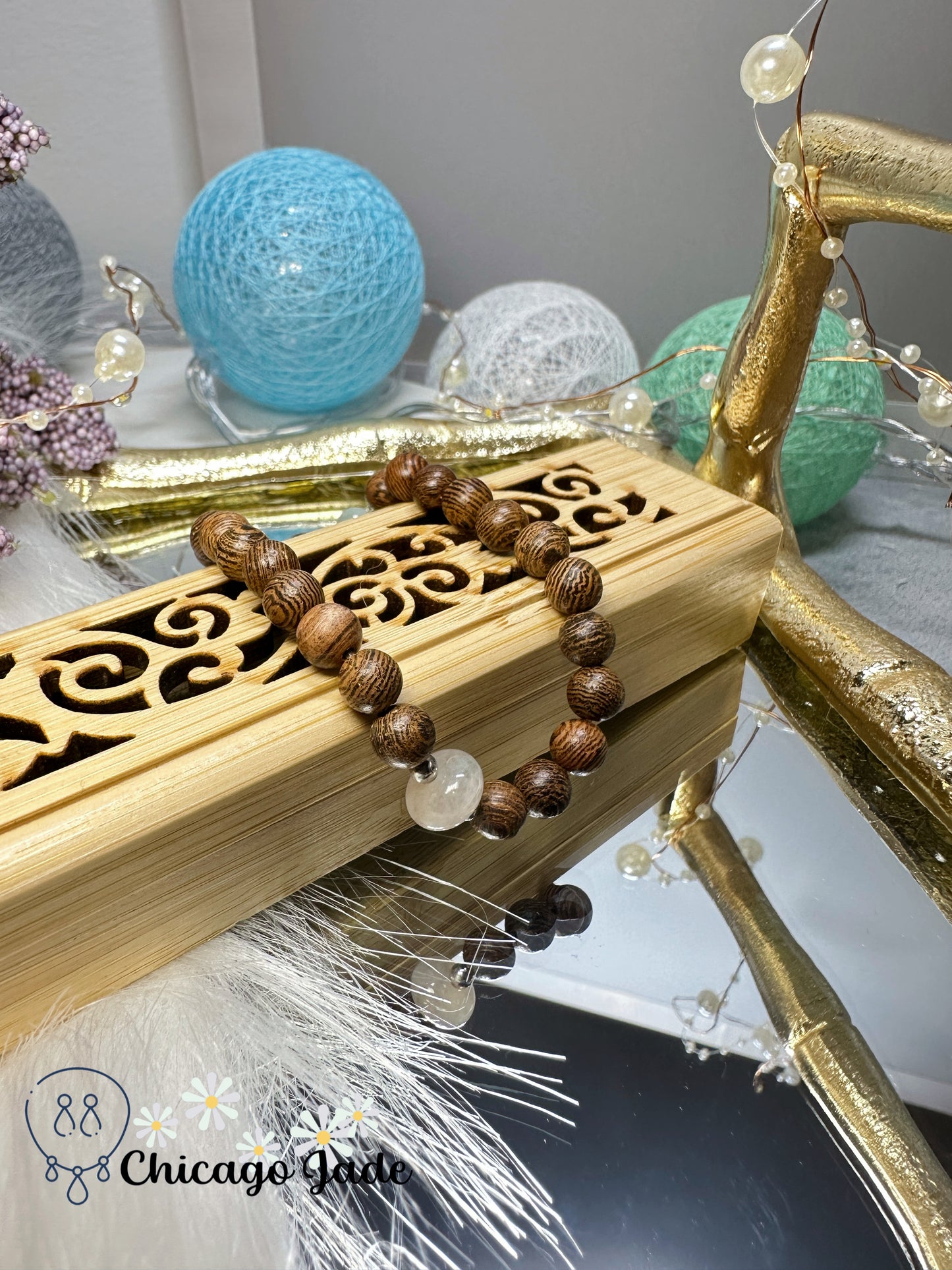 White base with highlights of gold color jadeite jade feicui bead with matching wood bead bracelet